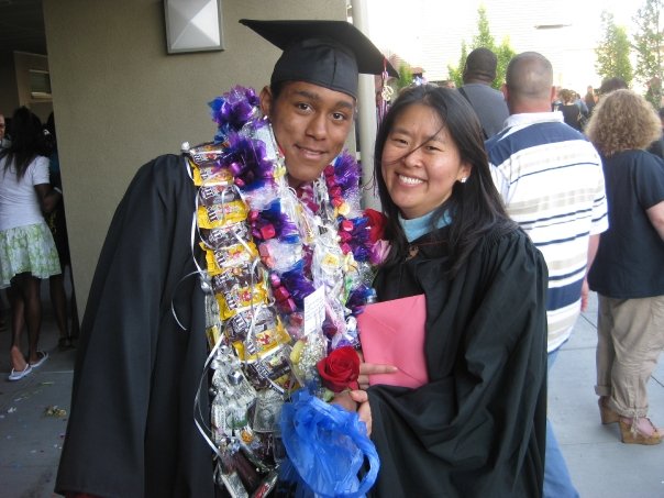Helen Kim at the 2009 Eastside commencement with Dwayne Williams, who went on to earn a degree in mechanical engineering from Gonzaga University.
