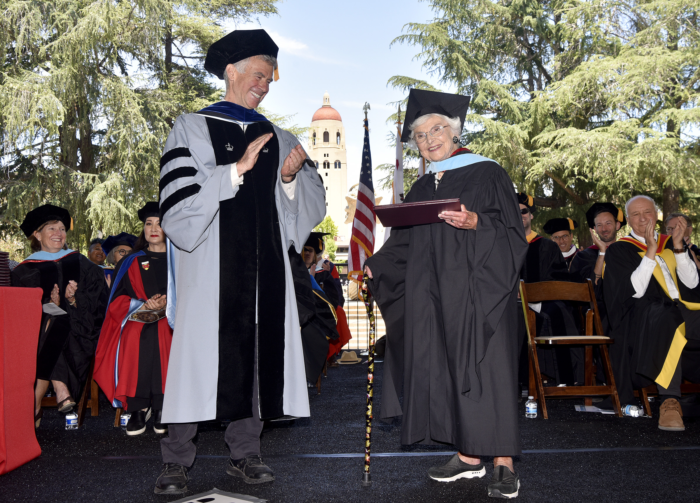 Virginia Hislop (right) accepts her diploma for her master of arts in education at the GSE’s 2024 commencement ceremony.