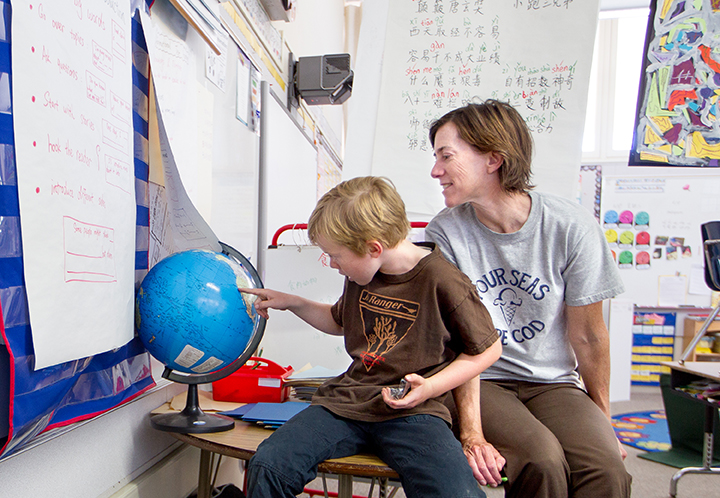 Tyler and his mother Susan Kramer in a classroom at Ohlone Elementary School in Palo Alto, Calif. (Photo by Norbert von der Groeben)