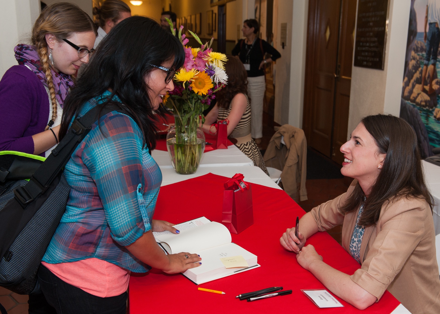 Dana Goldstein signs copies of her book, "The Teacher Wars," at the 2015 Cubberley Lecture (Photo: Steve Castillo)