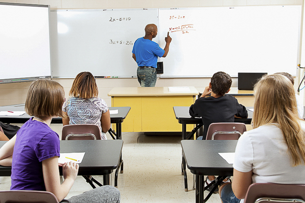 Cutting PE, arts or foreign language classes to give middle-school students struggling in math extra time in the subject improves their math test scores in the short term, but at what cost to their broader education? (Shutterstock)