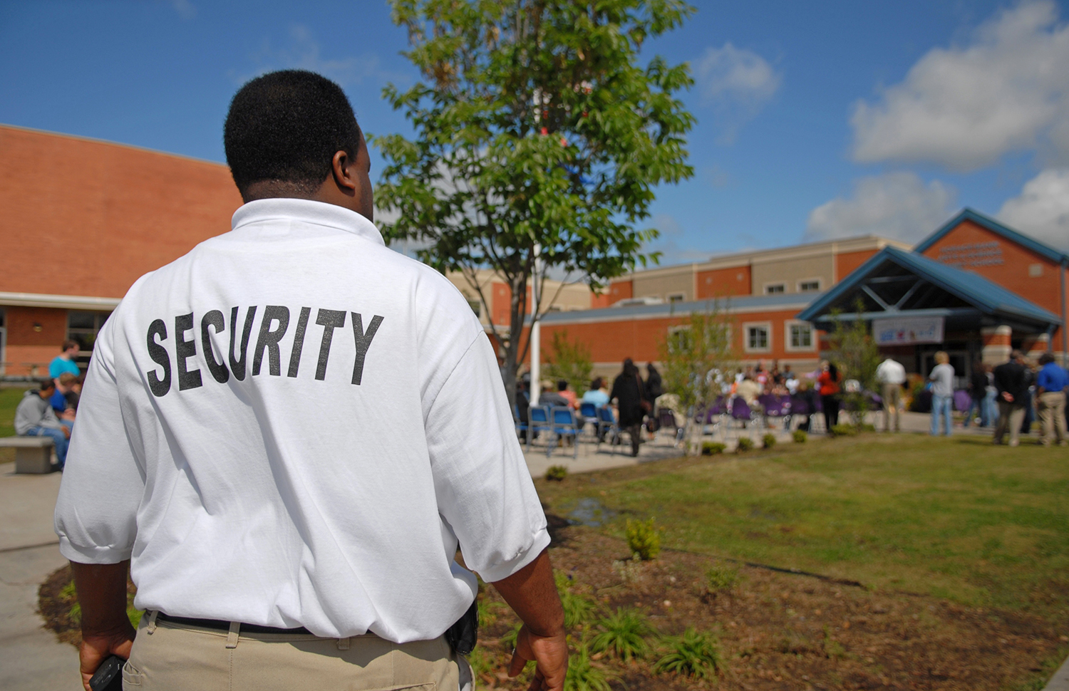 a security guard outside of a school
