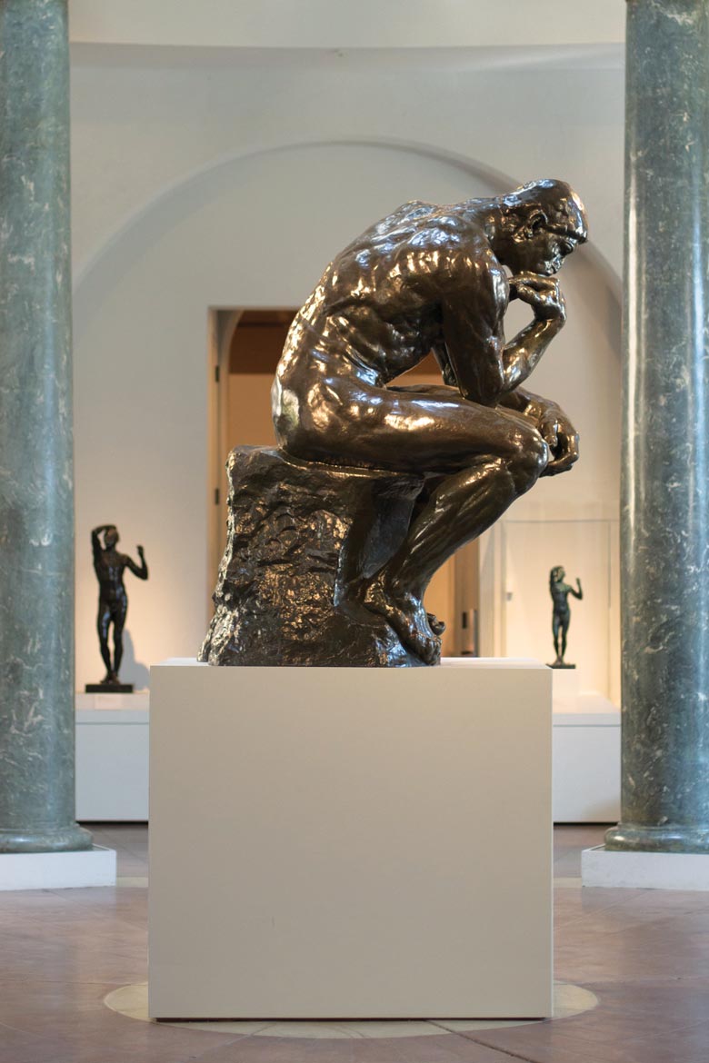 The Thinker, by Auguste Rodin, is on view at Cantor Arts Center. An image of the statue also appears on brochures celebrating the "Thinking Big About Learning" symposium on Oct. 18. (Tamer Shabani)