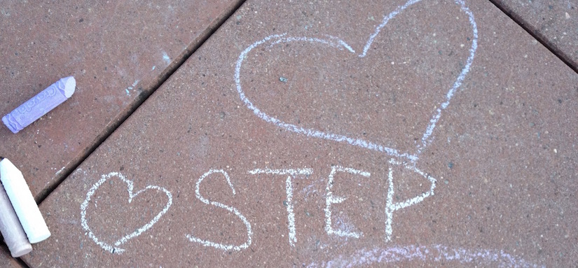 Chalk art with hearts and word STEP