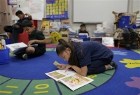Stanford, EPI study finds academic gains for minority students but English learners still lag behind. (AP Photo/Julie Jacobson)