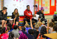 Stanford students read their children's book to 1st graders (Photo: Rod Searcey)