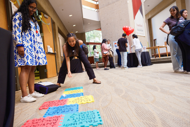 Jathusha Mahenthirarajan (standing at left) introduces CivicXChange, a platform designed to encourage constructive dialogue on divisive social issues. (Photo: Ryan Zhang)