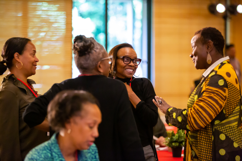 Attendees converse with Prudence Carter, a former professor at Stanford GSE. (Photo: Christine Baker)