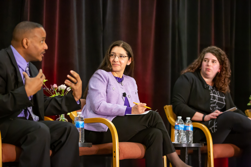 University of California at Berkeley professor Rucker Johnson (left), Texas A&amp;M University professor Kalena Cortes (middle), and Tufts University professor Elizabeth Setren discuss the effects of school integration efforts. (Photo: Christine Baker)