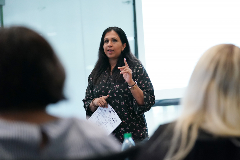 Lakshmi Balasubramanian, a lecturer and research associate at the GSE, leads a discussion during the four-day program. (Photo: David Gonzalez)