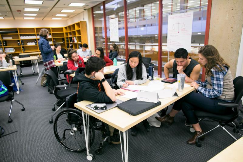 STEP students working in small groups in a class