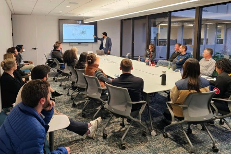 Albaraa Basfar, a Stanford postdoc in a pilot fellowship program led by the GSE and the School of Medicine, presents research in progress at a meeting in March. 