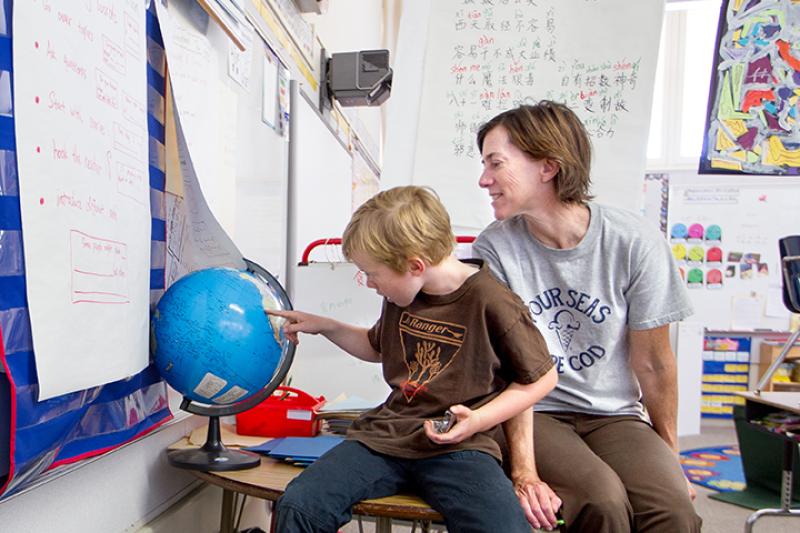 Tyler and his mother Susan Kramer in a classroom at Ohlone Elementary School in Palo Alto, Calif. (Photo by Norbert von der Groeben)