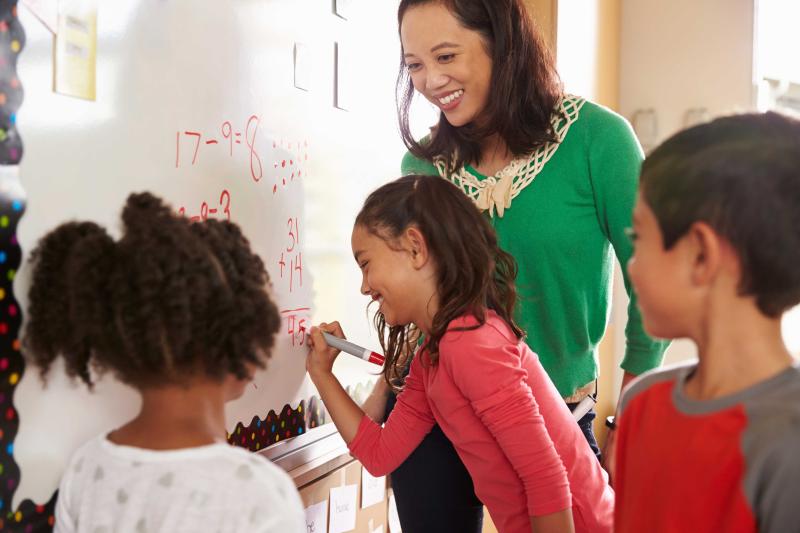 Photo: teacher with students (Photo: monkeybusinessimages/iStock)