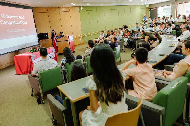 Students and family sitting for the ceremony
