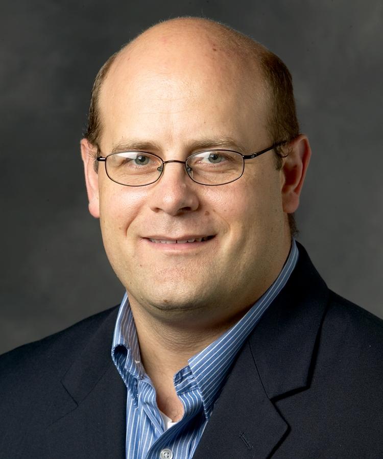 Associate Prof. Eric Bettinger