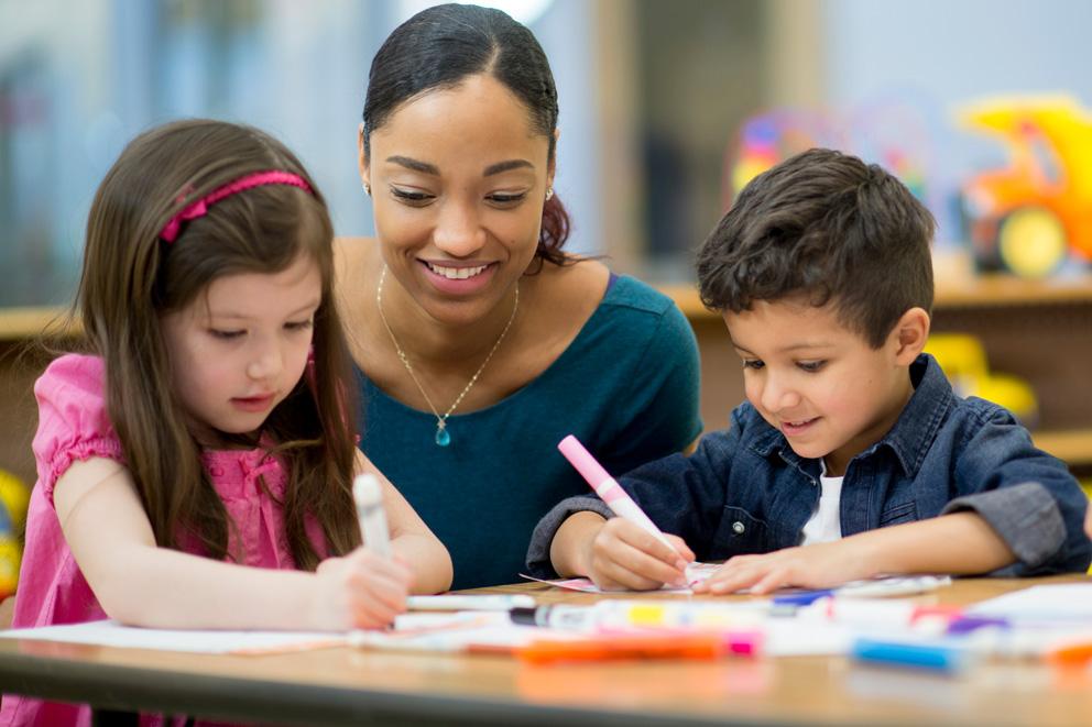 Picture of children and teacher in classroom