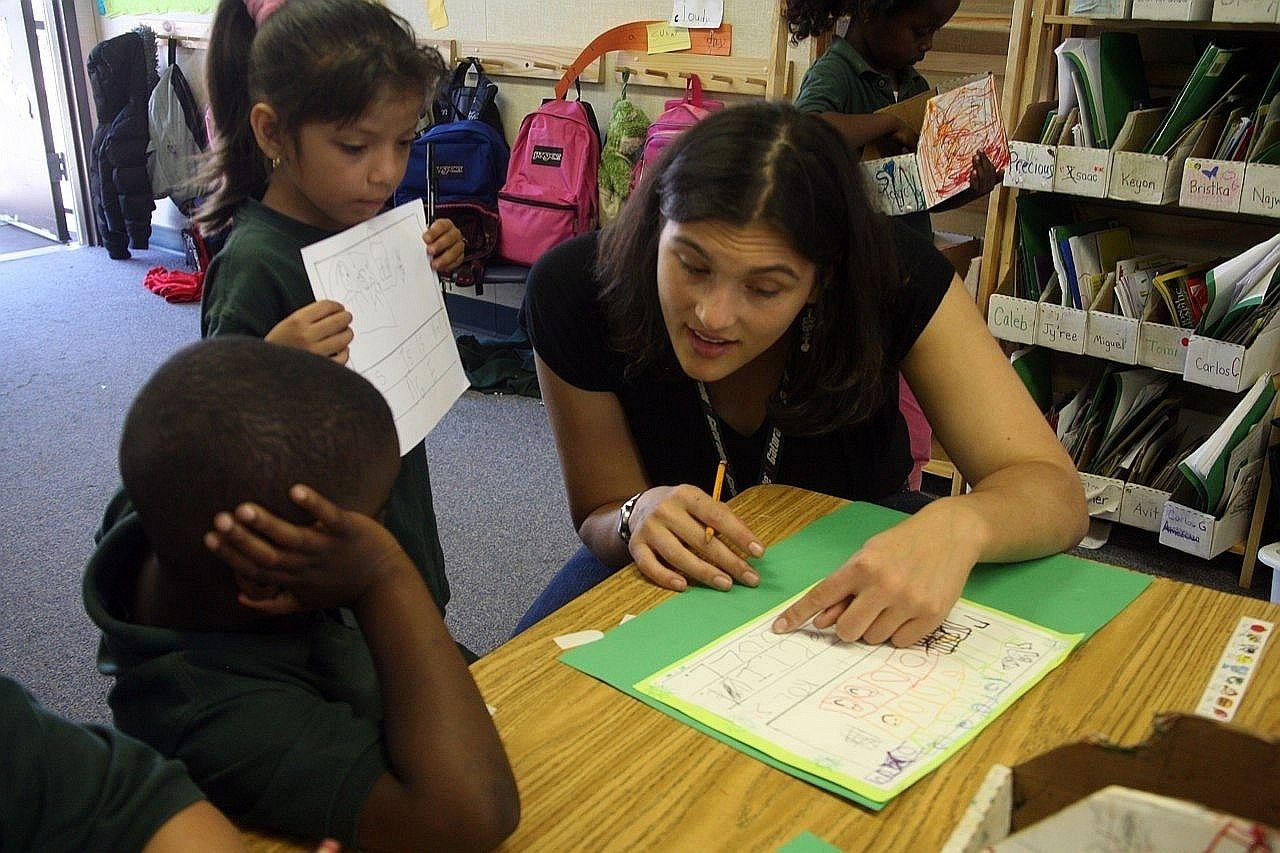 STEP alum Molly Loeb with students