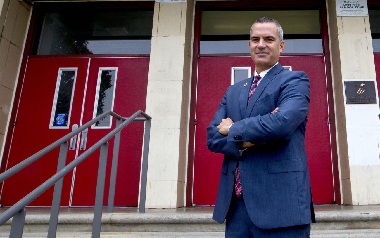 Barnaby Payne stands outside Abraham Lincoln High School (Photo by Norbert von der Groeben)