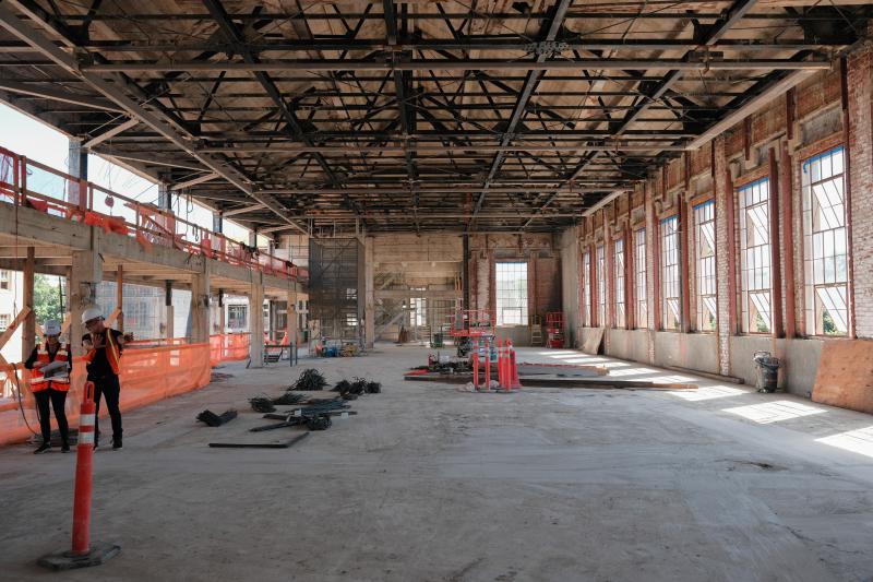 The former Cubberley Library will become a gathering space known as the great hall. The room has a unique steel truss system on the ceiling. (Photo: Ryan Zhang)