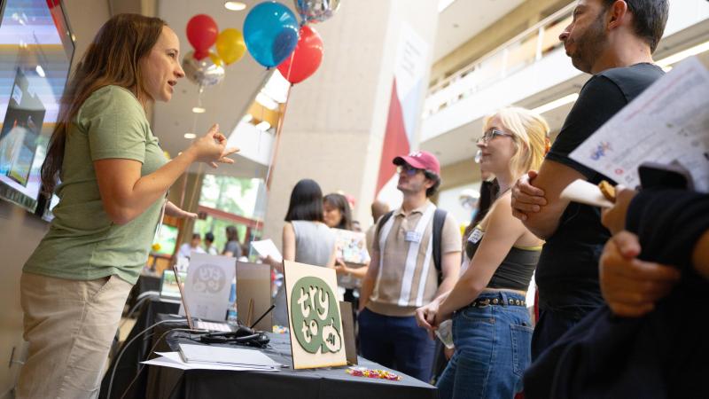 Christine Irish explains TryTo.ai to guests at Expo. (Photo: Joleen Richards)