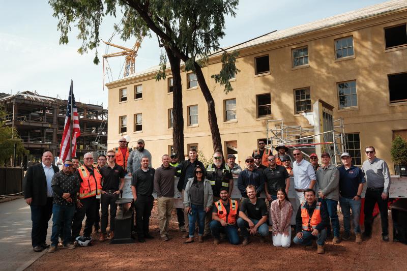 Members of McCarthy Building Cos., one of the many teams involved with the building, pose for a group shot. (Photo: Ryan Zhang)