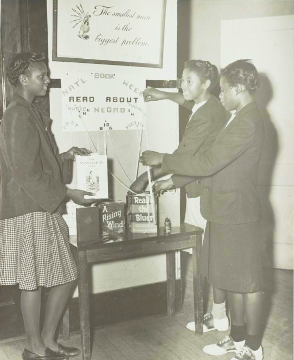 Photo of girls making a display for National Book Week