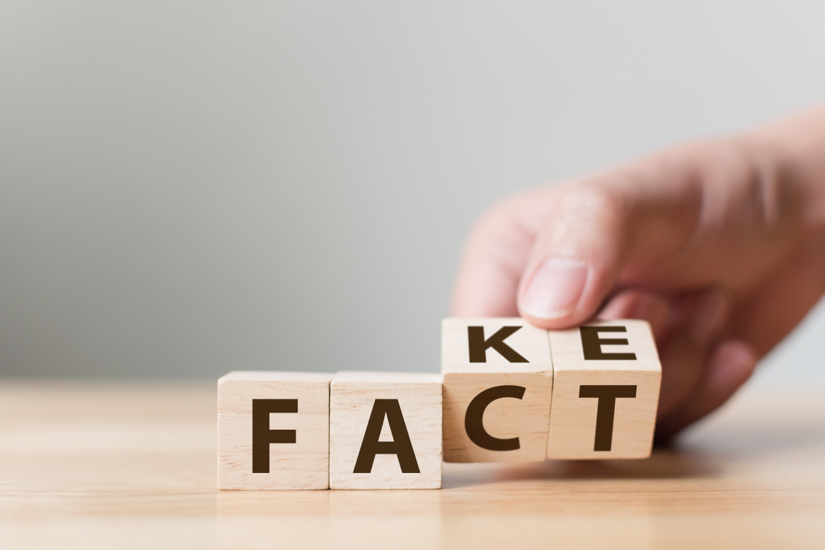 Photo of wooden block letters spelling, alternatively, "Fact" or "Fake"