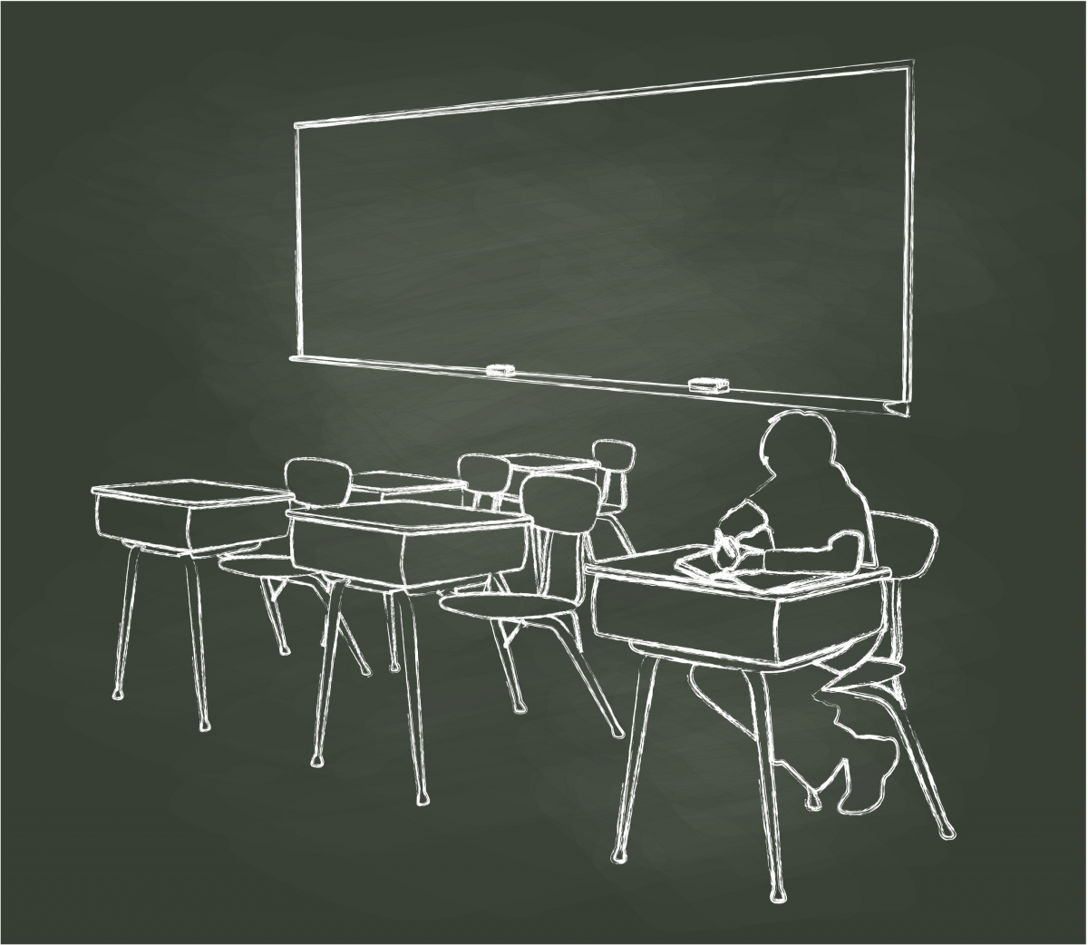 Photo of child in classroom with empty desks
