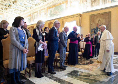 Photo of the pope greeting researchers