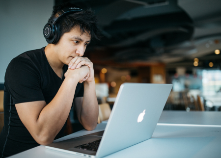 Photo of student on a computer