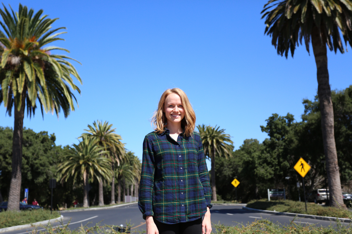 Photo of Taryn Moore in front of Palm dr. at Stanford