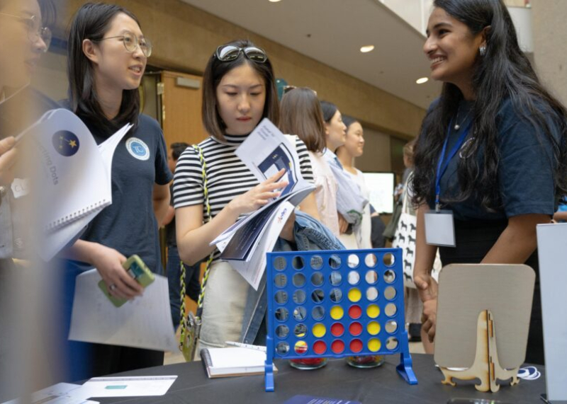 Stanford master's students in the Learning Design and Technology program present their projects at the annual LDT expo. (Photo: Joleen Richards)