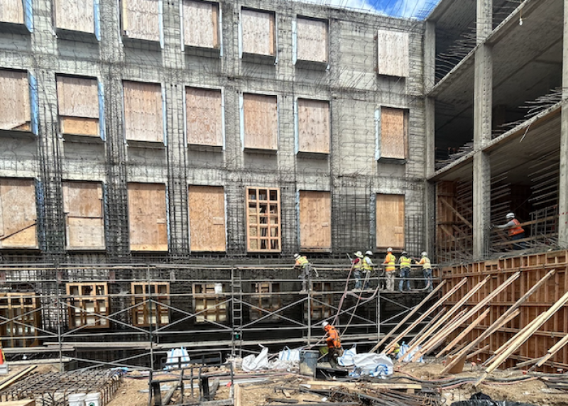 Construction workers shoring up supports for a wall of the historic north building in April 2024. (Photo: McCarthy Building Companies, Inc.)