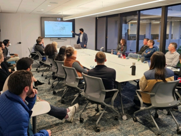 Albaraa Basfar, a Stanford postdoc in a pilot fellowship program led by the GSE and the School of Medicine, presents research in progress at a meeting in March. 