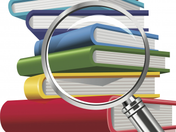 Magnifying glass on a stack of textbooks