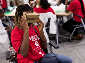 Photo of kids using cardboard VR viewers
