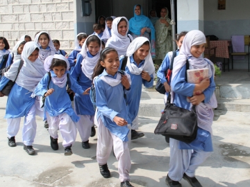Study finds that a brief phone call improves student enrollment in Pakistan. (Vicki Francis/Dept for International Development)