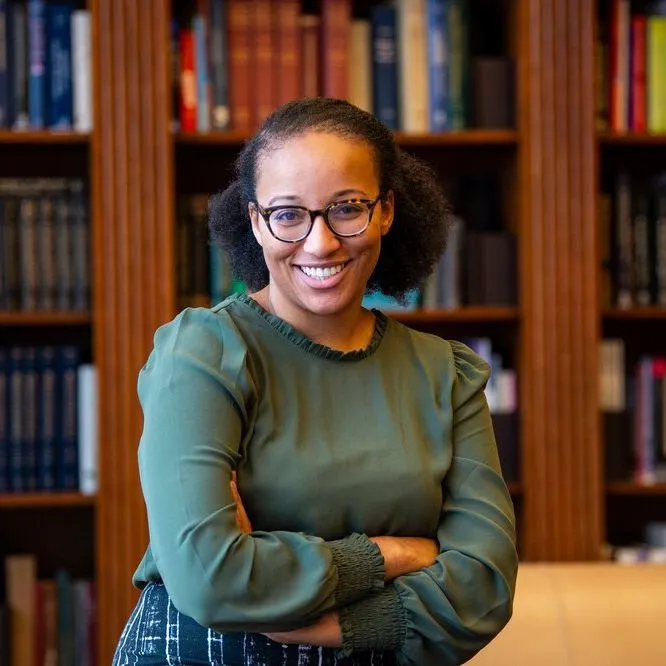 Dr. Dominique Baker