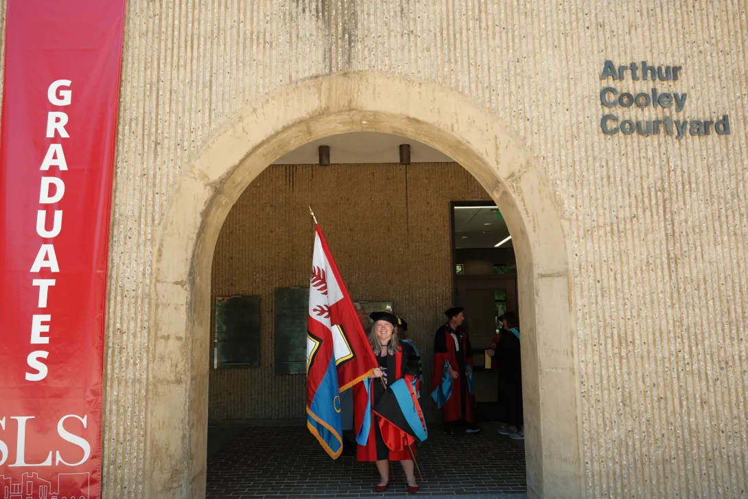 Kaylee Tuggle Matheny, PhD '23, was this year's flag bearer. (Photo: Ryan Zhang)