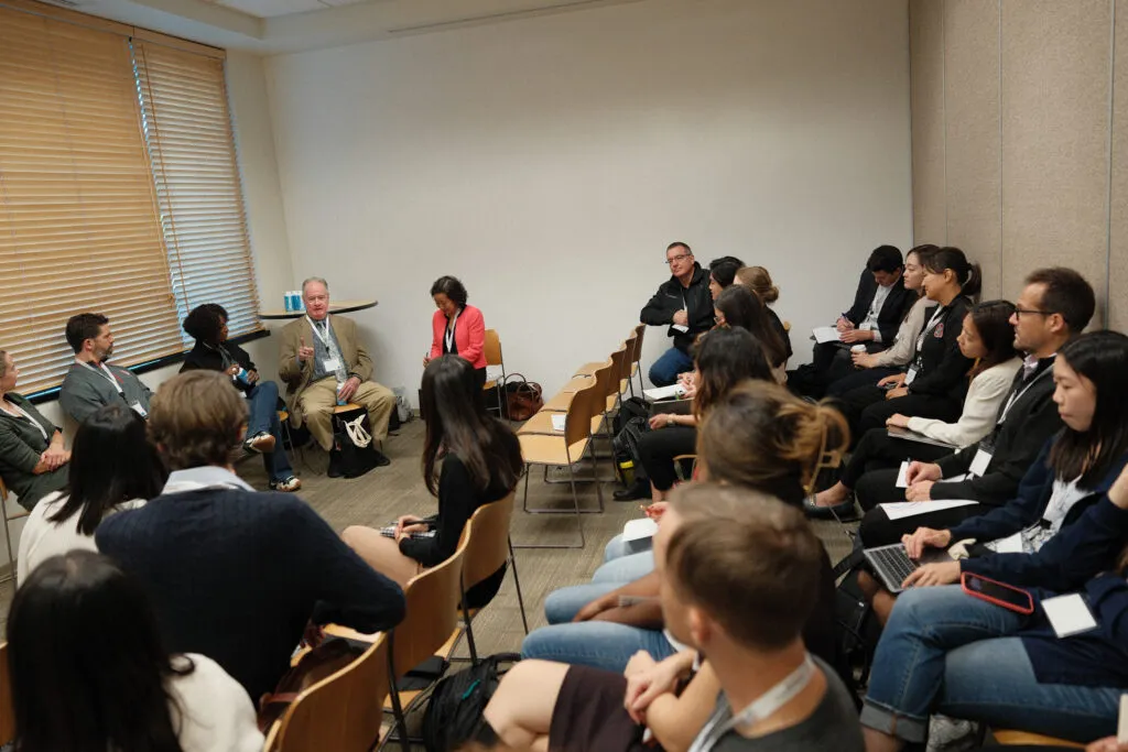 Students listen to a panel about careers in education entrepreneurship at the 2023 Accelerate Edtech Impact Summit.